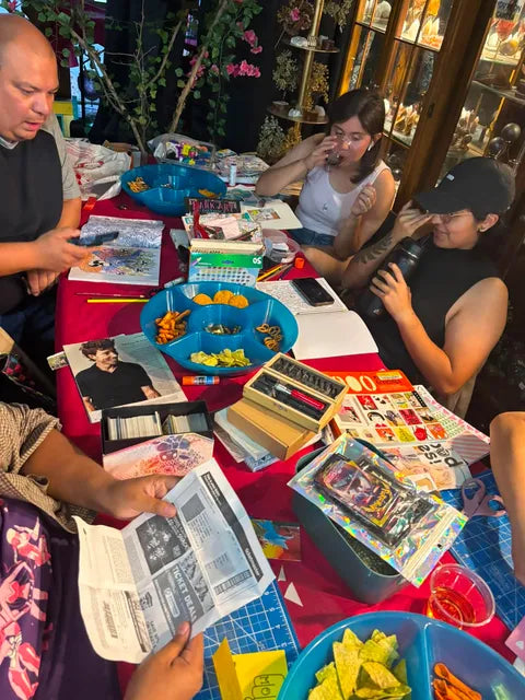 Guests creating junk journals during the Border Artist Society meetup at Magnolia Grove