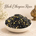 Black Ethiopian Resin natural resin incense in an elegant ceramic bowl