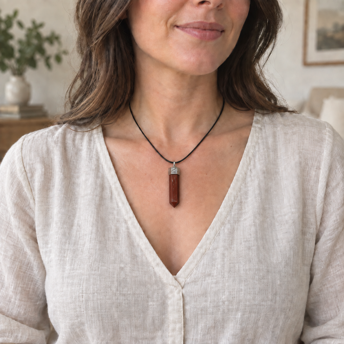 Red Jasper pencil pendant — worn on a black cord