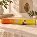 SAC San Judas Tadeo incense, 20 sticks, displayed horizontally on warm ivory stone